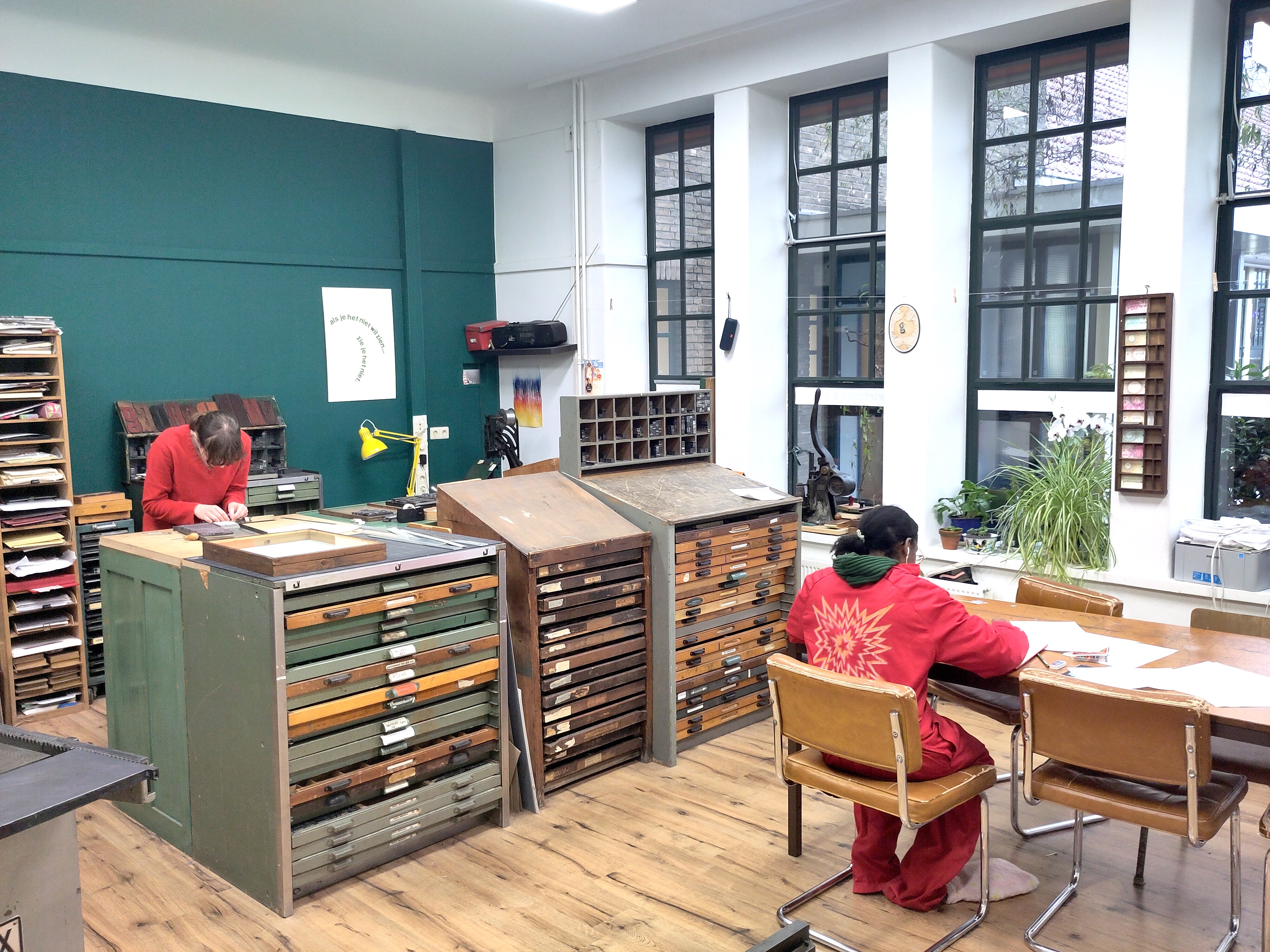 deelnemers in de werkplaats